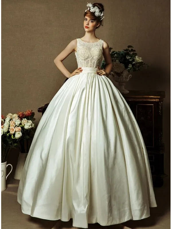 Abito da Sposa con gonna a palloncino di Taffeta con corpetto semitrasparente e scollo a goccia