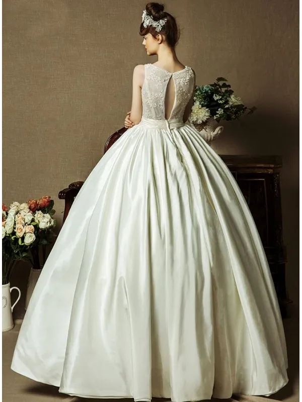 Abito da Sposa con gonna a palloncino di Taffeta con corpetto semitrasparente e scollo a goccia