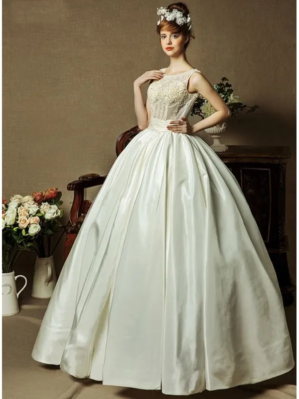 Abito da Sposa con gonna a palloncino di Taffeta con corpetto semitrasparente e scollo a goccia