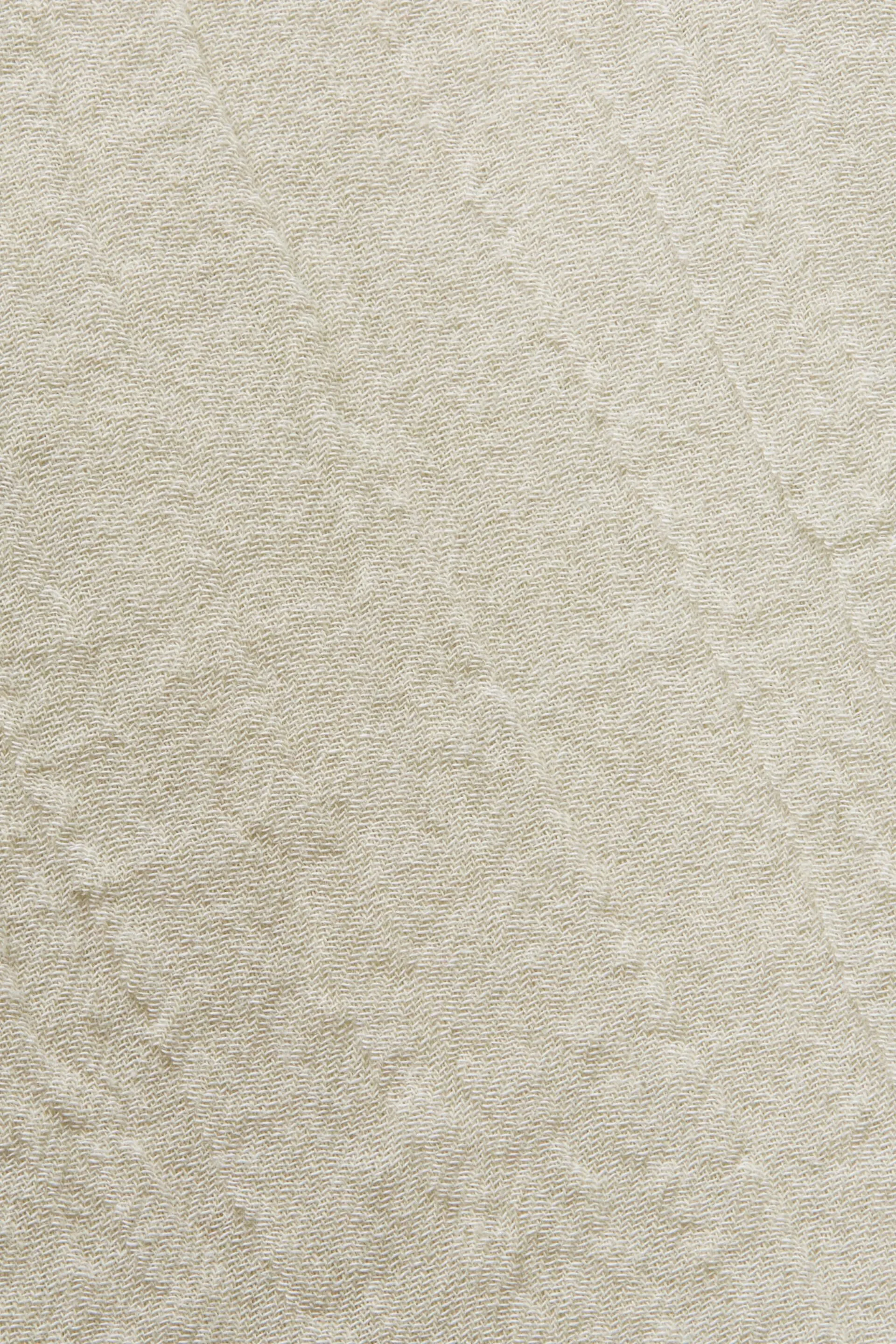 Abito midi effetto stropicciato con cintura
