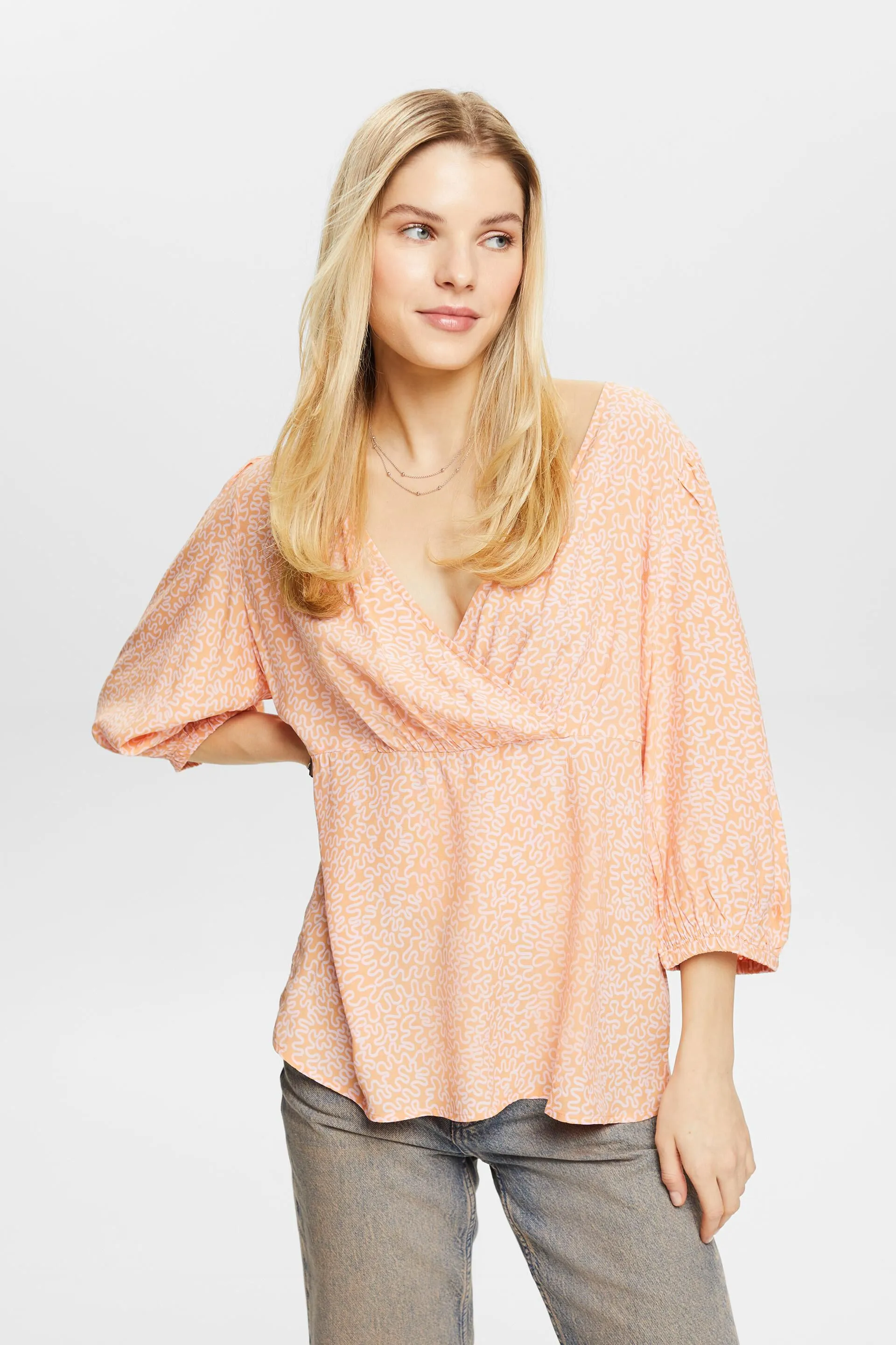 Blusa in crêpe con stampa e scollo a V