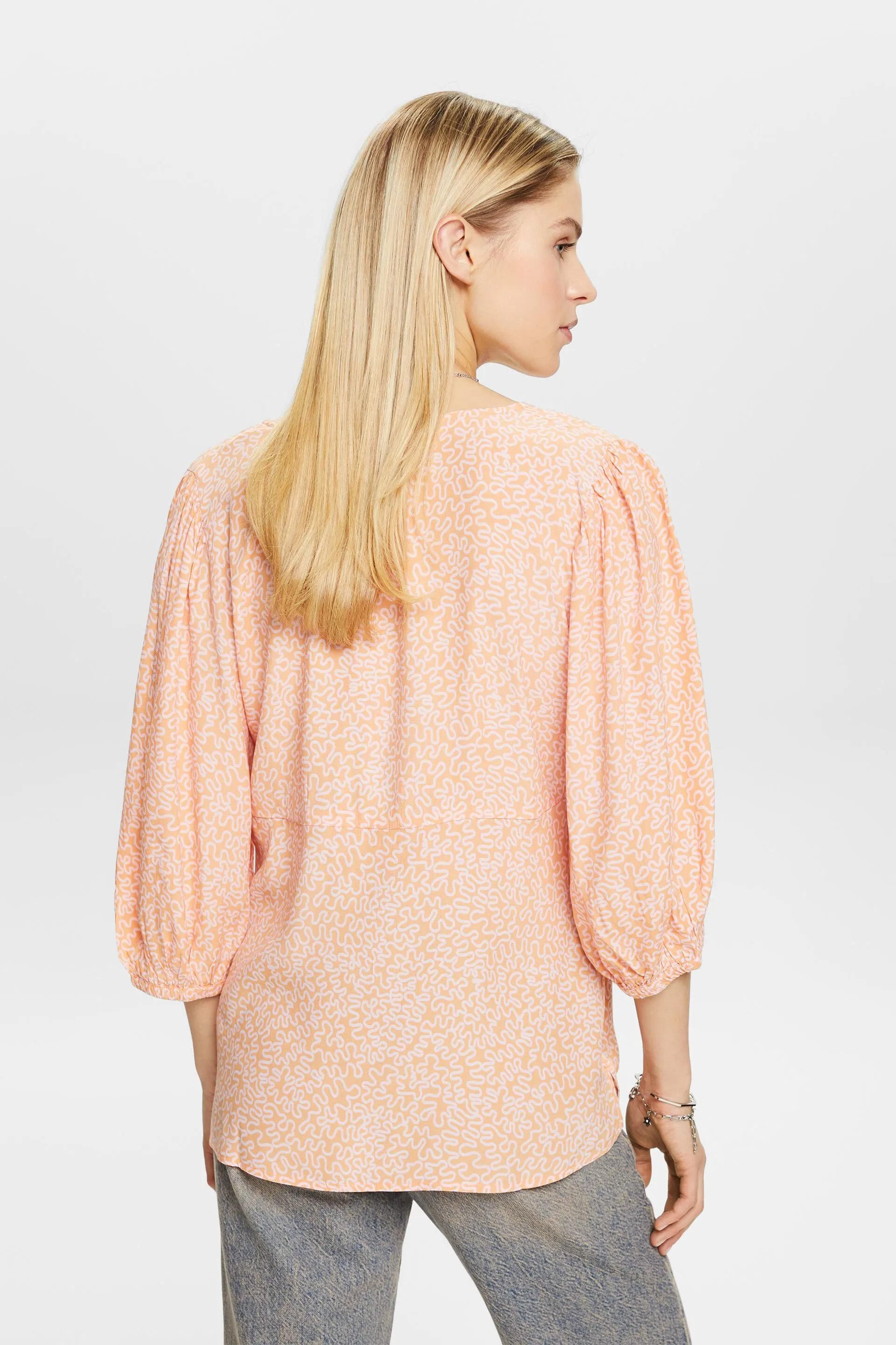 Blusa in crêpe con stampa e scollo a V