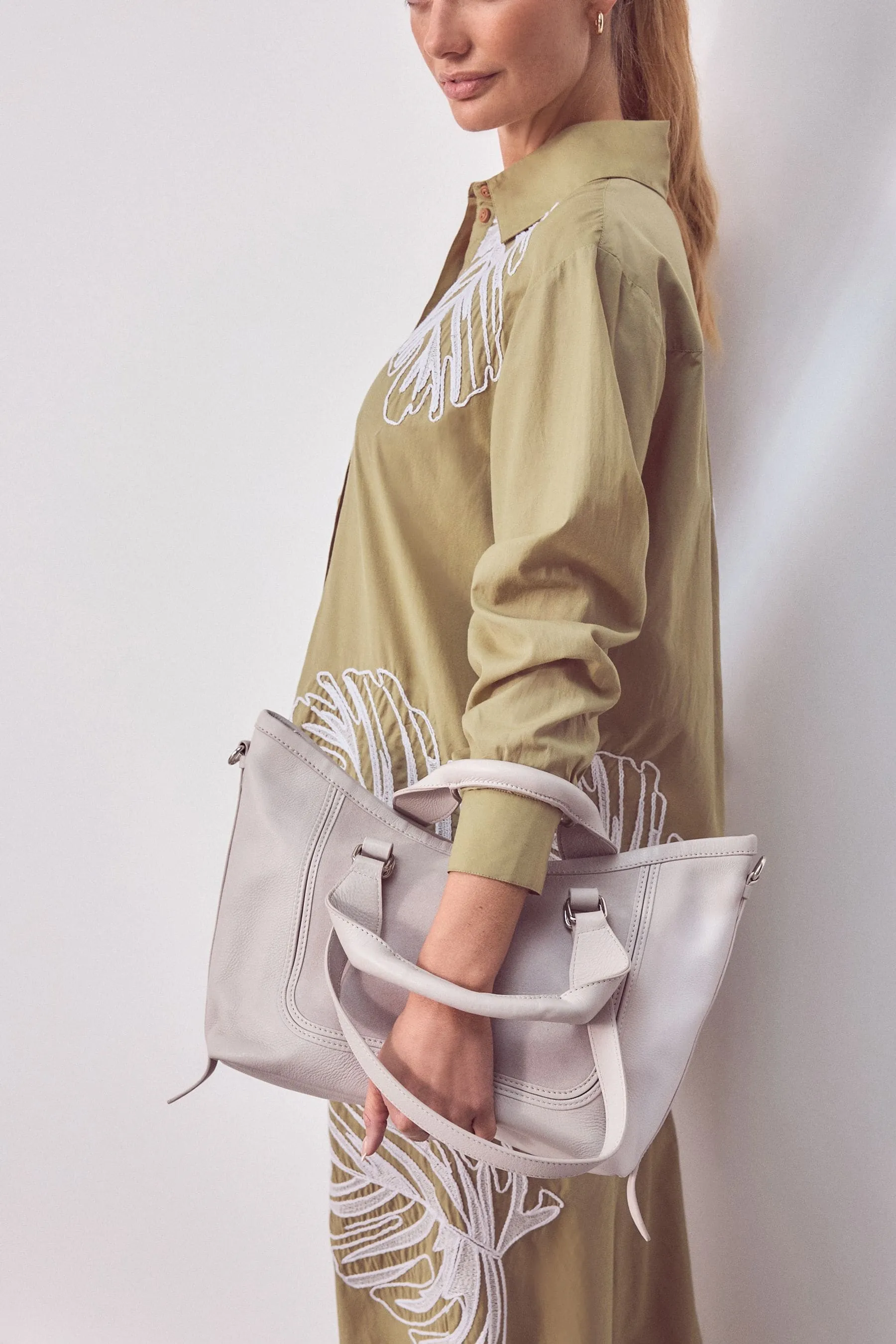 Borsa a mano a mano in pelle