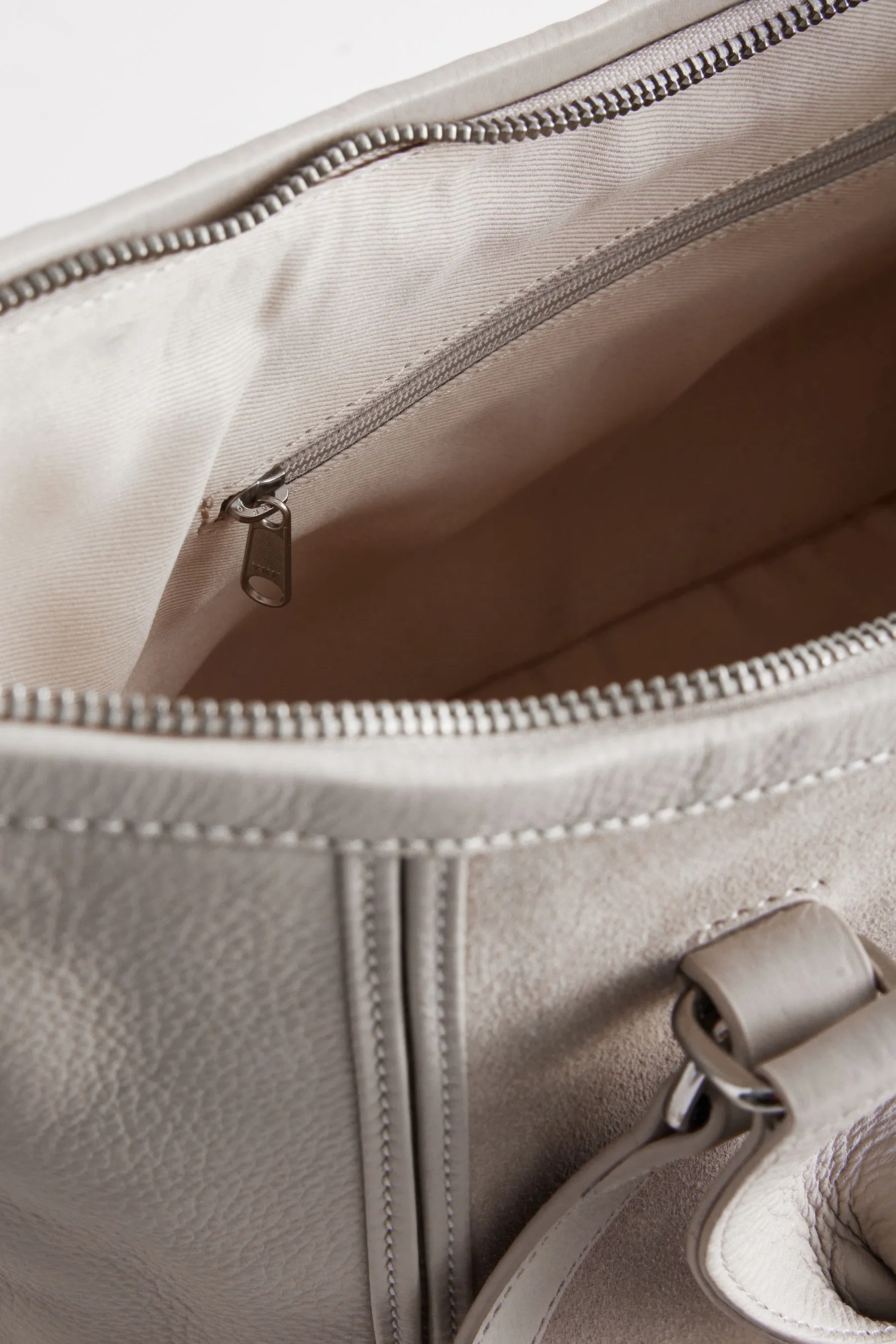 Borsa a mano a mano in pelle
