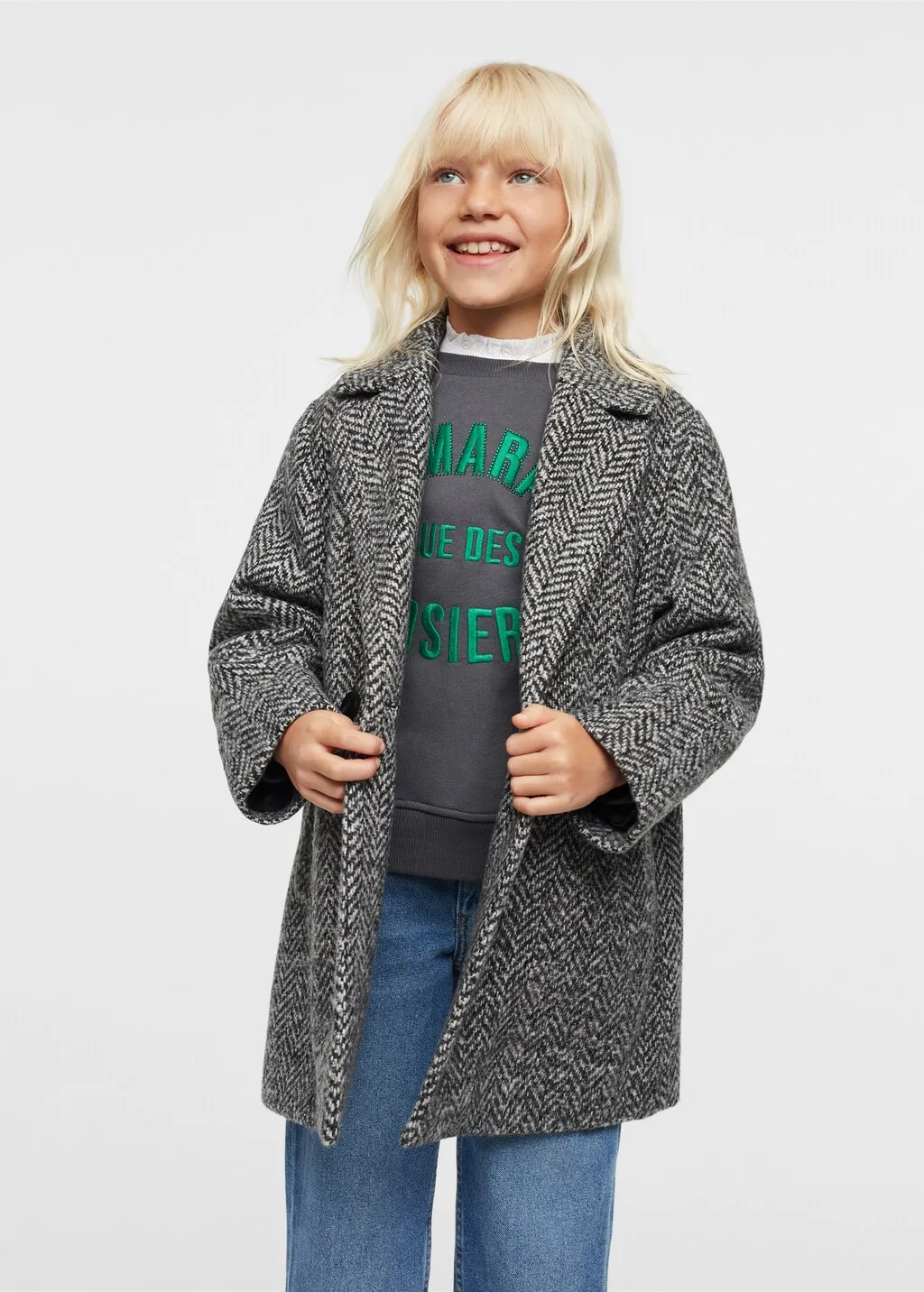 Cappotto tessuto spigato