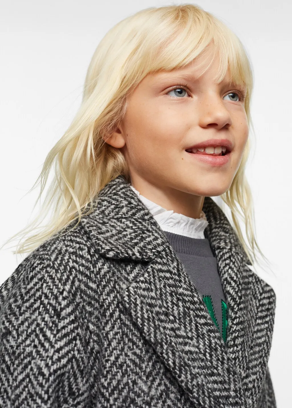 Cappotto tessuto spigato