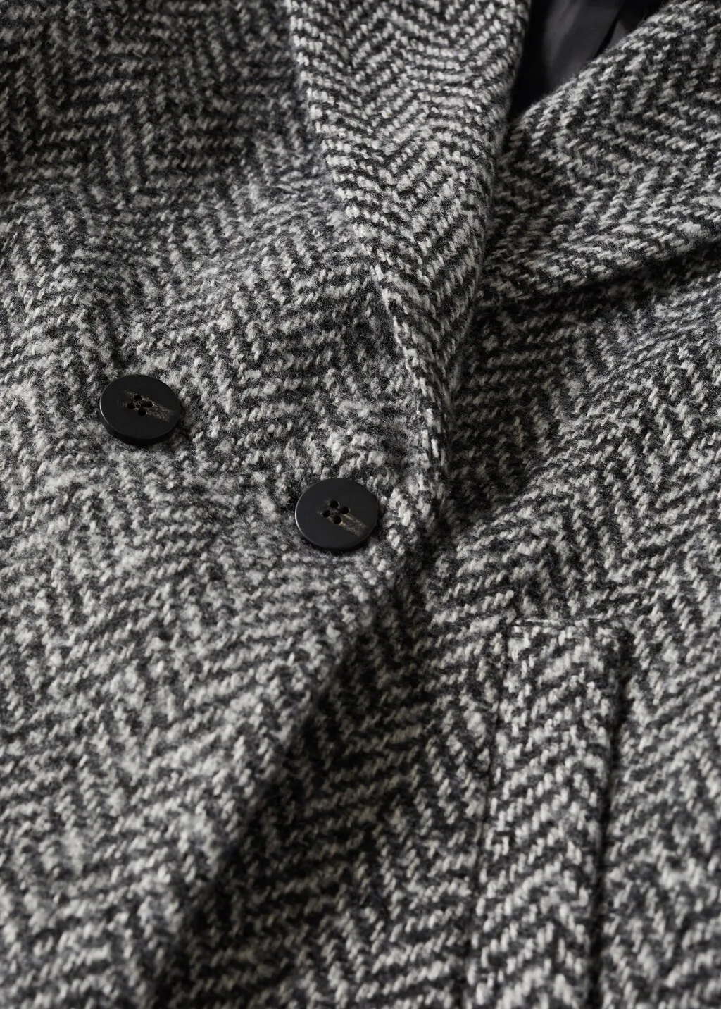 Cappotto tessuto spigato