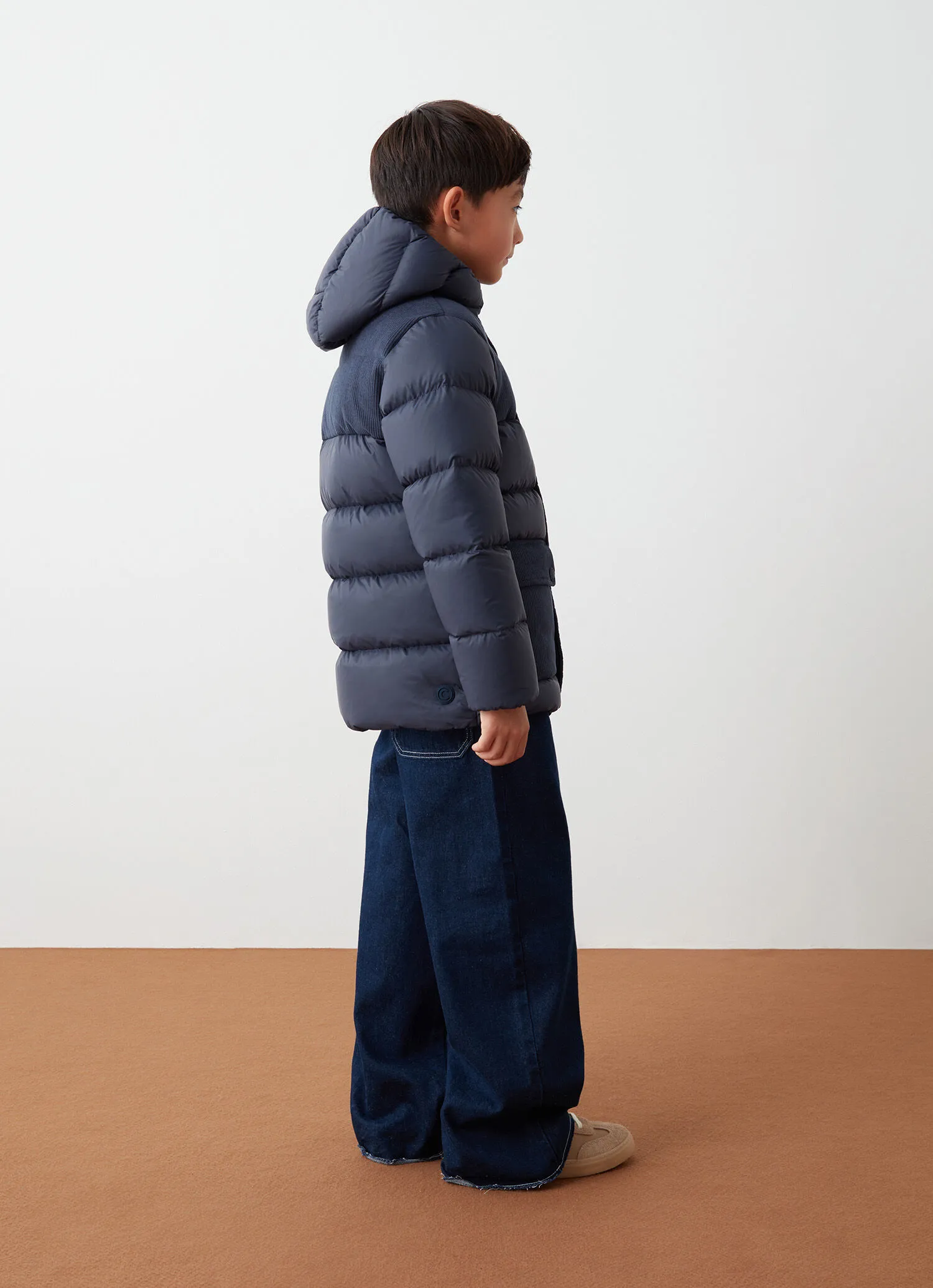 Down-padded parka with corduroy inserts