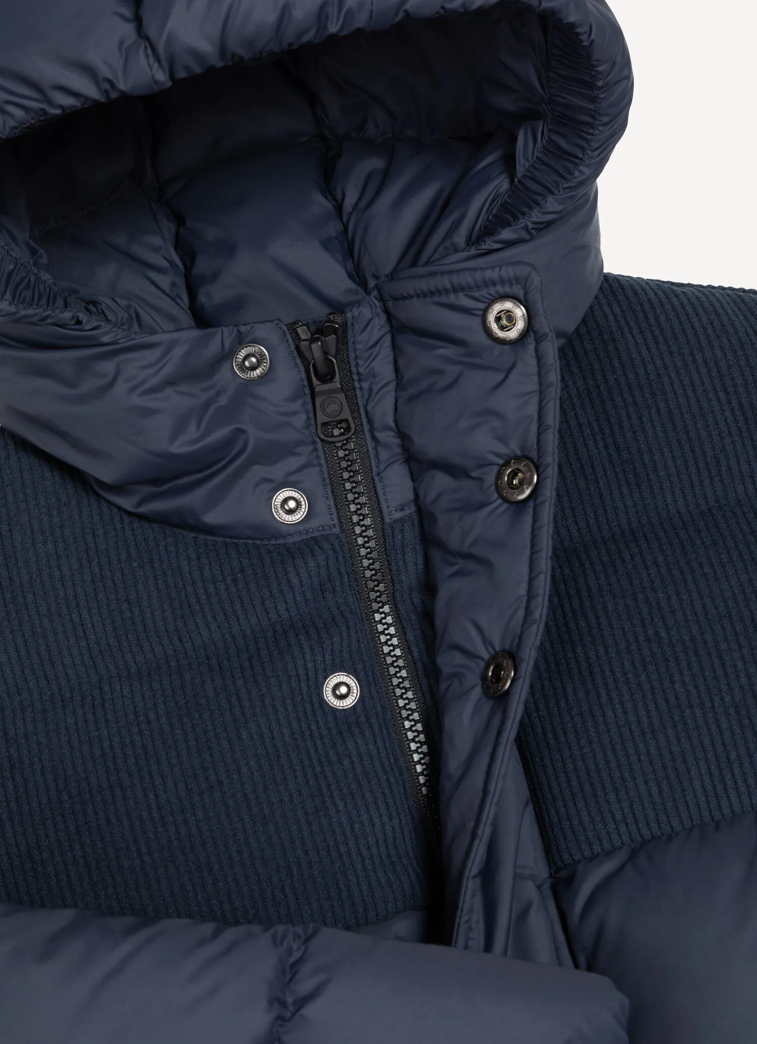 Down-padded parka with corduroy inserts