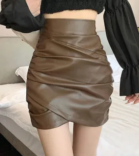 Gonne in pelle Donna Pieghe incrociate Pu Mini Gonna nera Primavera Moda Casual Caffè Gonne Donna