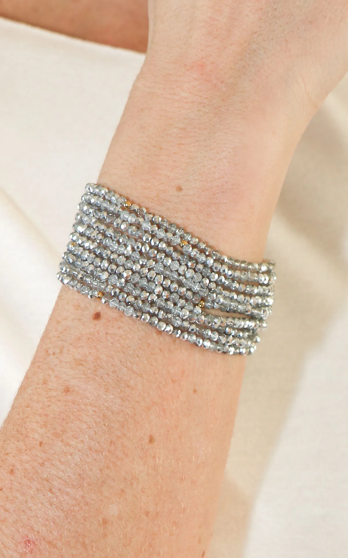 Just – Bracciale elasticizzato fili di perline – Argento