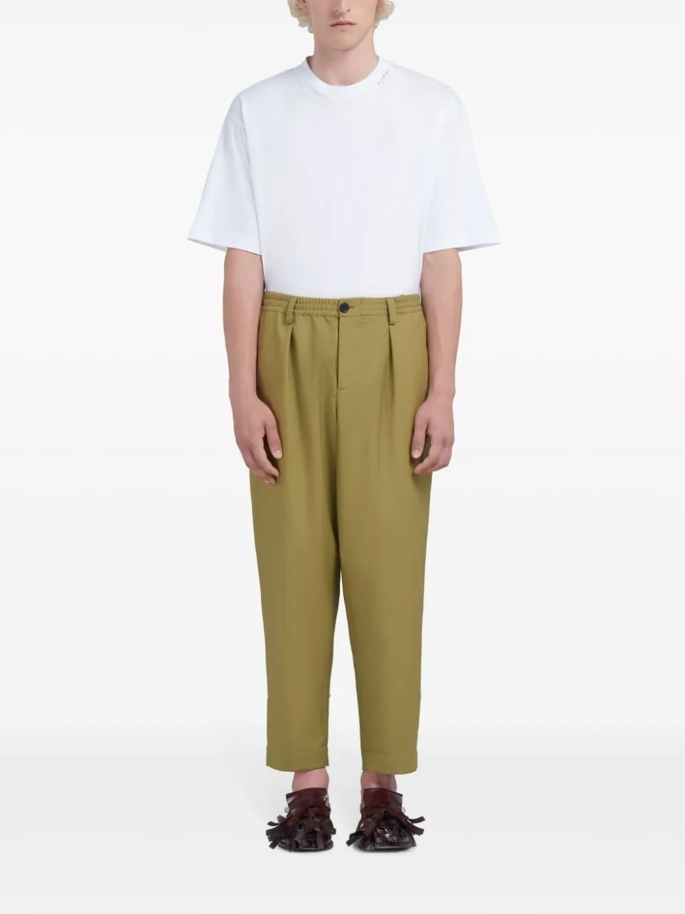 Pantaloni affusolati con pieghe in verde - uomo