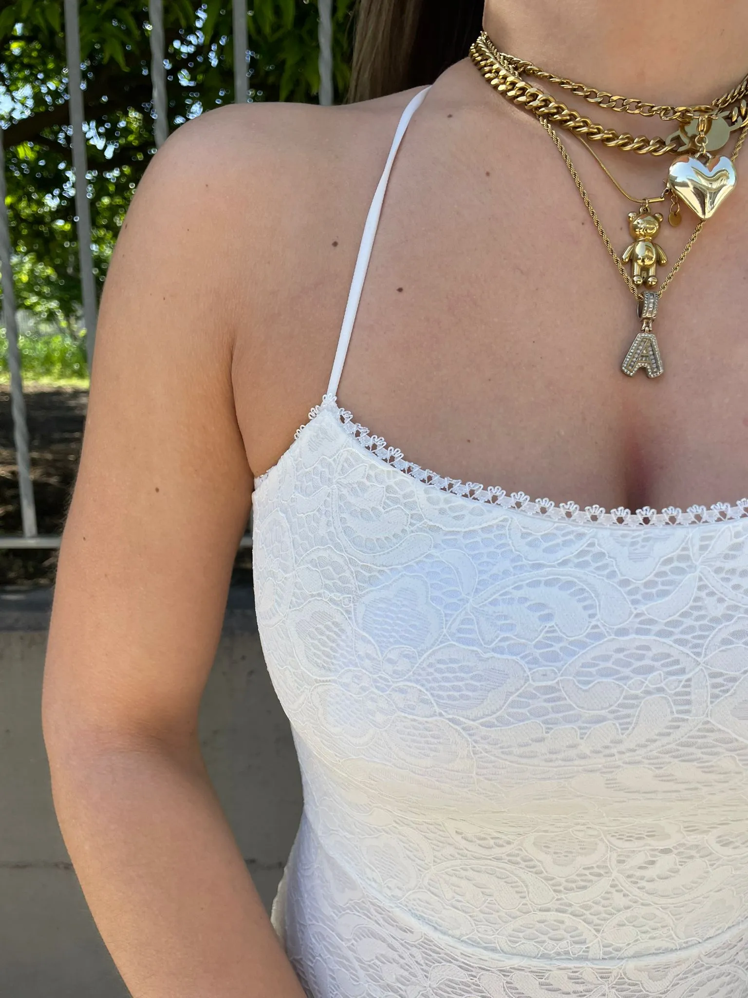 Vestito lungo in merletto con schiena scoperta